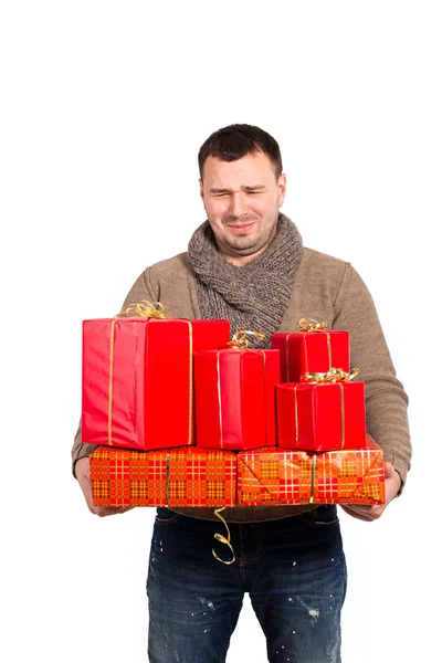 Jovem segurando presentes comprados — Fotografia de Stock