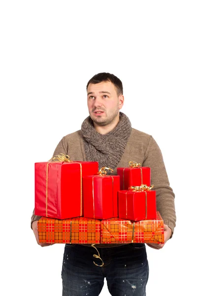 Giovane uomo in possesso di regali acquistati — Foto Stock