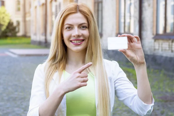 Beautiful Business Woman Points White Business Card Her Hand Mockup — 图库照片