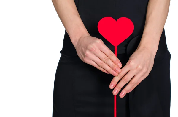 Female hands holding heart out of pape — Stock Photo, Image