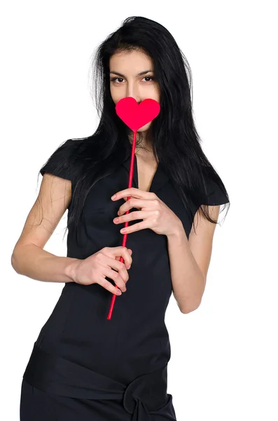 Morena en vestido negro con corazón de papel — Foto de Stock