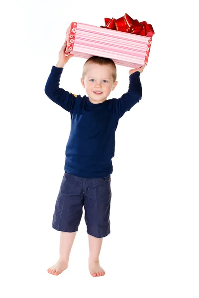 Jongen bedrijf geschenk — Stockfoto