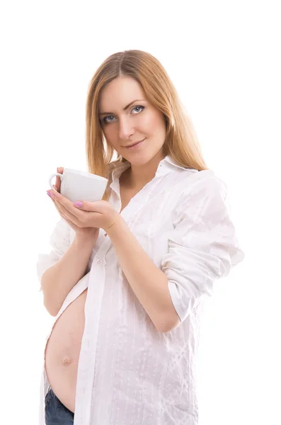 Femme enceinte avec tasse de thé — Photo