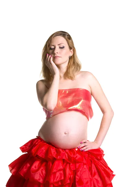 Fashionable beautiful pregnant in luxurious skirt Stock Image
