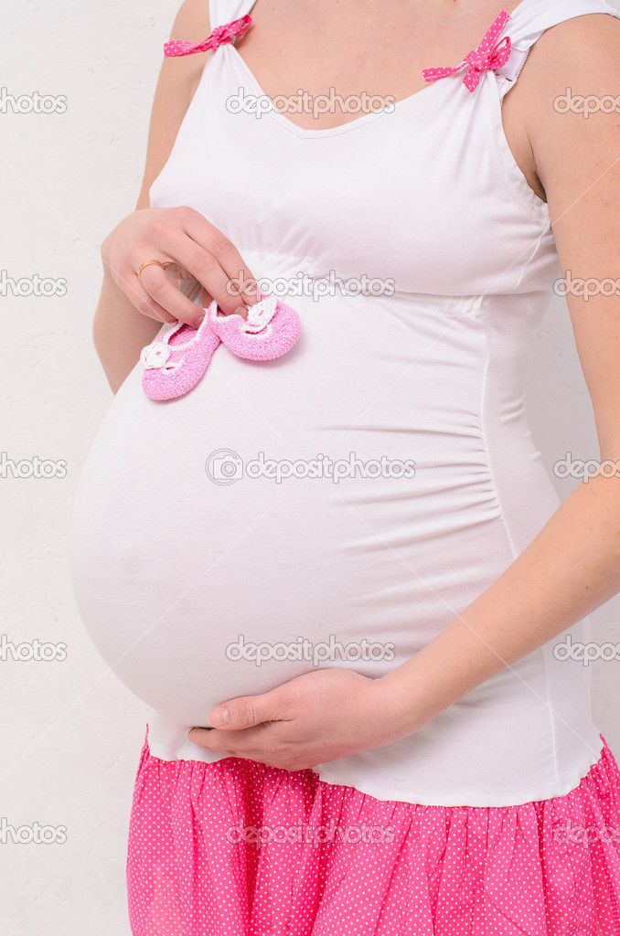 Pregnant belly closeup Stock Photo by ©Cheese_78 42829313