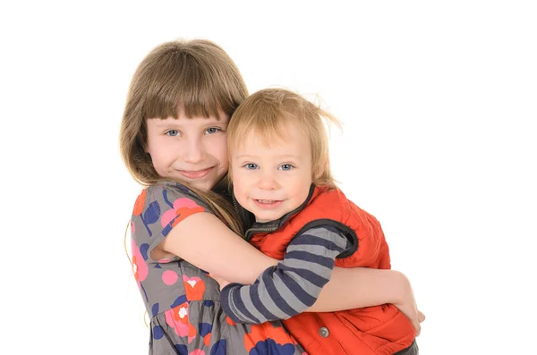 Sister hugging brother — Stock Photo, Image