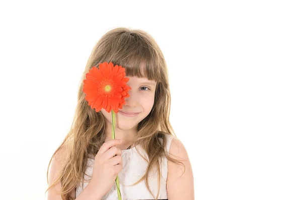 Pretty girl with flowers for mom — Stock Photo, Image