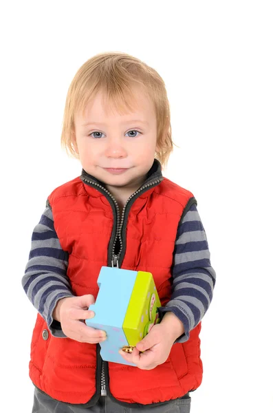 Handsome boy with gift box for mom — Stock Photo, Image