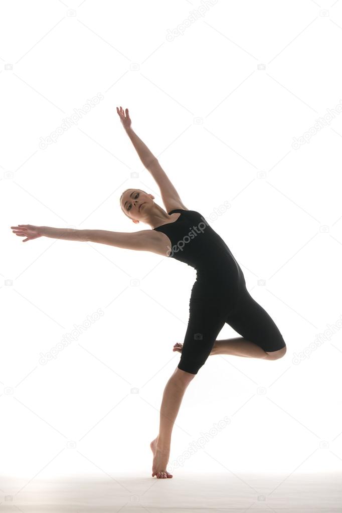 Svelte sporty female dancer in movement