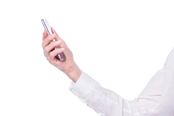 흰색 배경에 분리 된 최신 스마트폰을 들고 있는 나이든 여성 손의 근접 사진 — 스톡 사진
