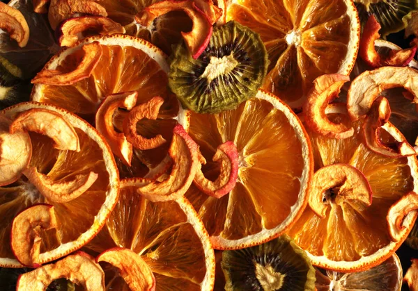 Dried fruit slices orange, lemon, apple keefy close-up top view — Stock Photo, Image