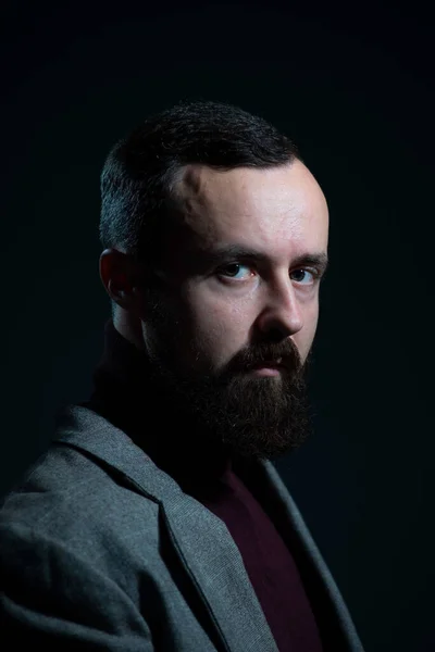 Dramatic Portrait Bearded Millennial Guy Jacket Sweater Dark Background — Stock Photo, Image
