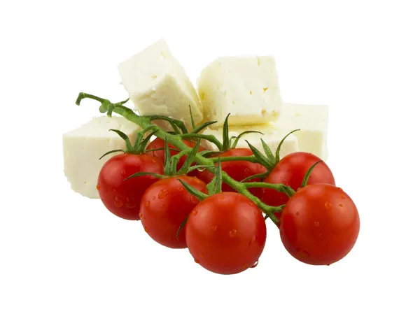 Pomidory i ser grecki. na białym tle — Zdjęcie stockowe