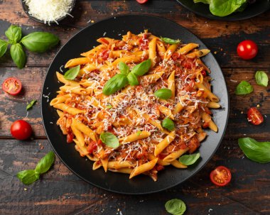 JackFruit pasta with garlic, olives, capers, tomato and cheese. Healthy vegan, diet food. clipart