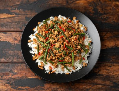 Pork Stir Fry with Green Beans, rice, garlic, chili and ginger. Asian food