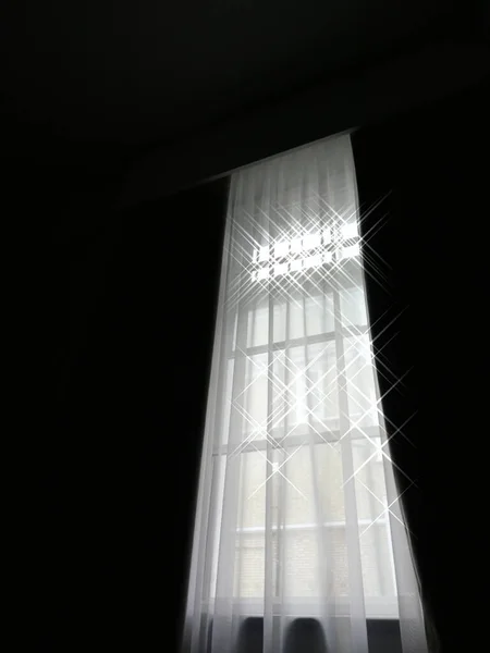 Semi-abstract picture of long tall window with sunlight streaming in — Stock Photo, Image