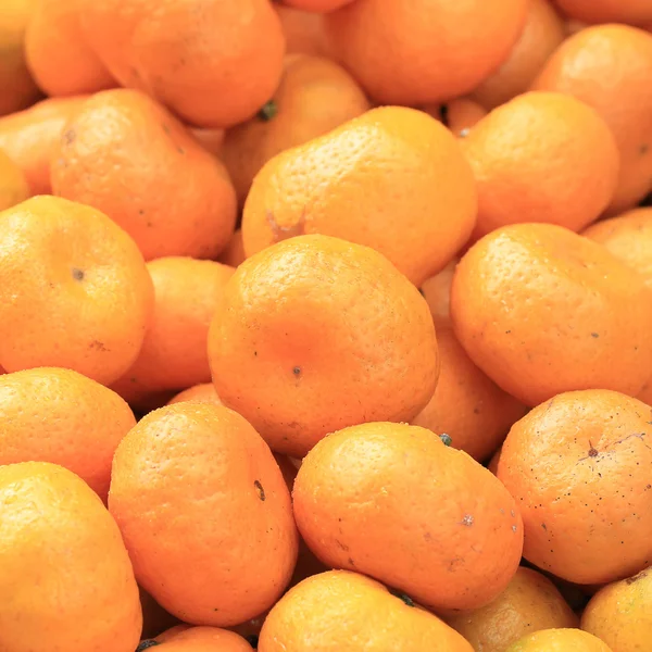 Orange on market tray — Stock Photo, Image