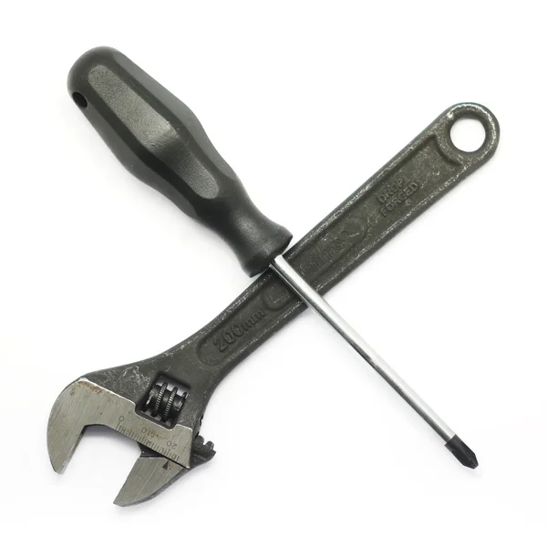 Screwdriver and adjustable wrench — Stock Photo, Image