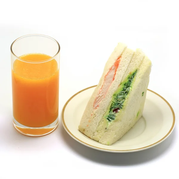 Kanapki i pomarańczowy sok — Zdjęcie stockowe