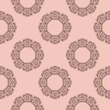 Pembe desenli, klasik süslemeli.