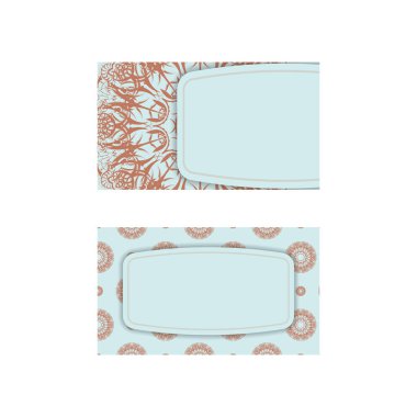 İş yeriniz için Hint mercan süsleri içeren deniz mavisi renkli kartvizit..