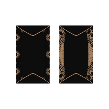 Eskimiş kahverengi desenli siyah kartvizit..