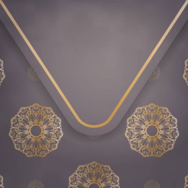 Kahverengi renkli kart ve mandala altın süsü. Tebrik ederim..