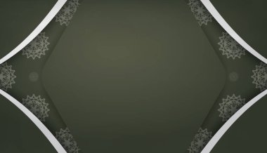 Antika beyaz süslemeleri ve metin için alanı olan koyu yeşil bir pankart.