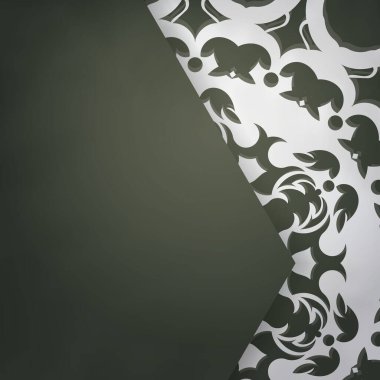 Koyu yeşil kartpostal ve markanız için klasik beyaz süsler..