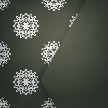 Kartpostal, tipografi için hazırlanmış antika beyaz süslemelerle koyu yeşildir..