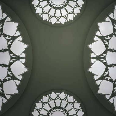 Koyu yeşil renkli, beyaz desenli bir kartpostal. Tebrikler..