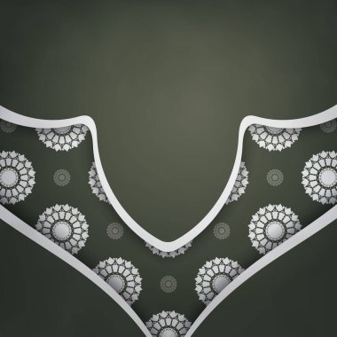 Koyu yeşil renkli, mandala beyaz desenli bir kartpostal şablonu tipografi için hazırlandı.