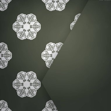 Broşürde koyu yeşil renkli ve tipografi için hazırlanmış beyaz süslemeler var..