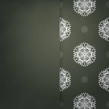 Koyu yeşil renkli bir kartpostal şablonu ve markanız için klasik beyaz süsler..