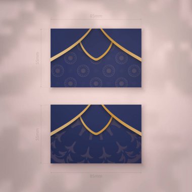 Koyu mavi renkli bir kartvizit şablonu ve işleriniz için lüks altın süsler..