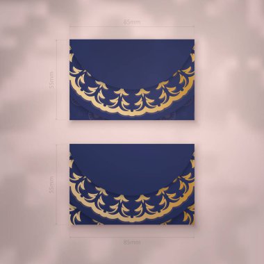 Markanız için klasik altın desenli koyu mavi bir kartvizit şablonu..