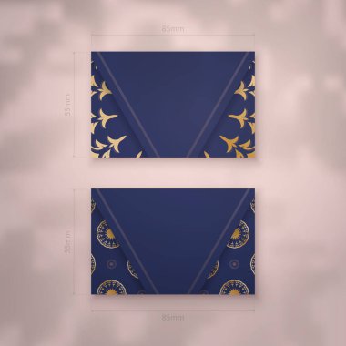 İş kartı şablonu koyu mavi ve bağlantılarınız için klasik altın desenli..