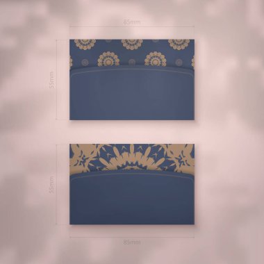 Markanız için Yunanca kahverengi süslemeleri olan mavi renkli şık kartvizit..