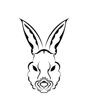 Dövmeli bir tavşanın başı. 2023 'ün izole edilmiş sembolü. El yapımı..