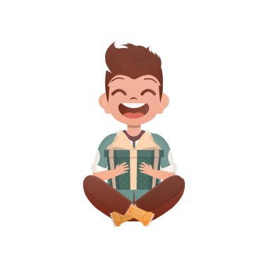 Küçük bir çocuk nilüfer pozisyonunda tasvir edilir ve elinde bir hediye kutusu tutar. Doğum günü, yeni yıl ya da tatil teması. Çizgi film stili, izole.