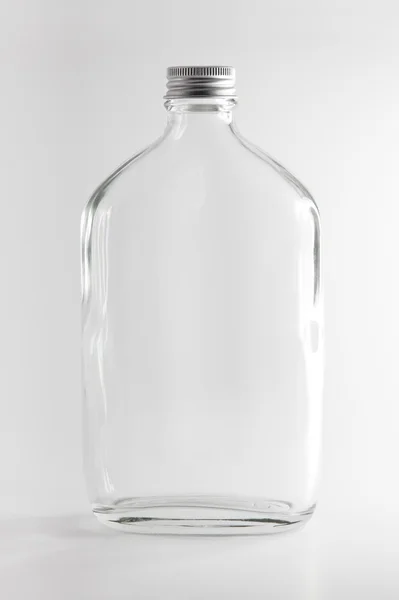 Puste butelki jasne, w tle — Zdjęcie stockowe