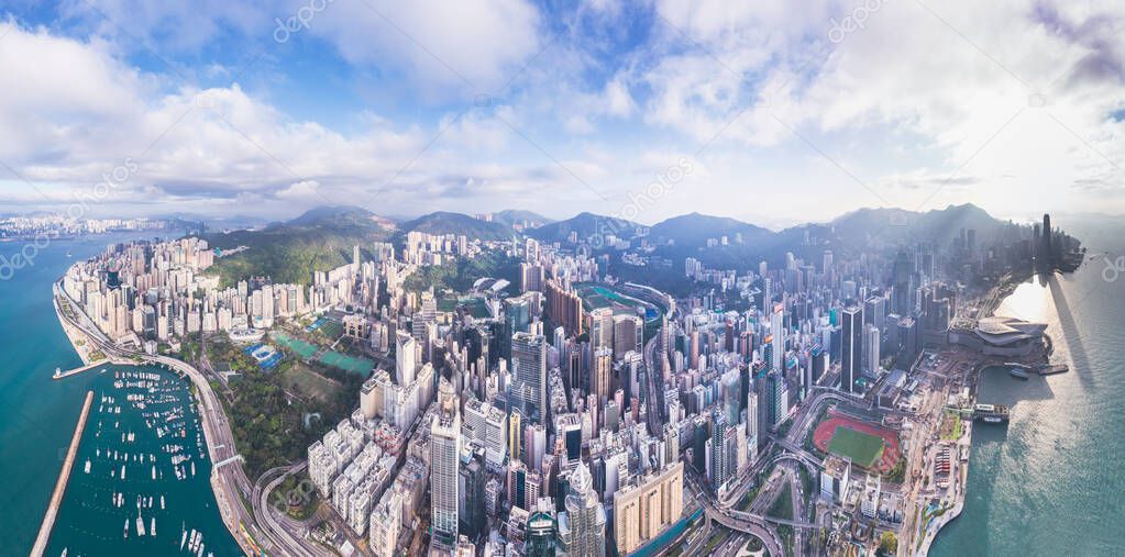 Amazing aerial panorama of the Causeway Bay and Wan Chai district of Hong Kong, daytime