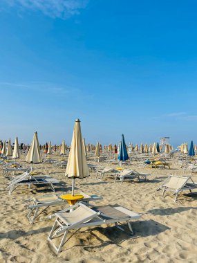 Front view to waters of Adriatic Sea and sandy beach close to Durres in Albania. Clear blue sky. Copy paste. Summer holidays concept.