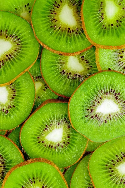 Kiwi fruit slices background — Stock Photo, Image
