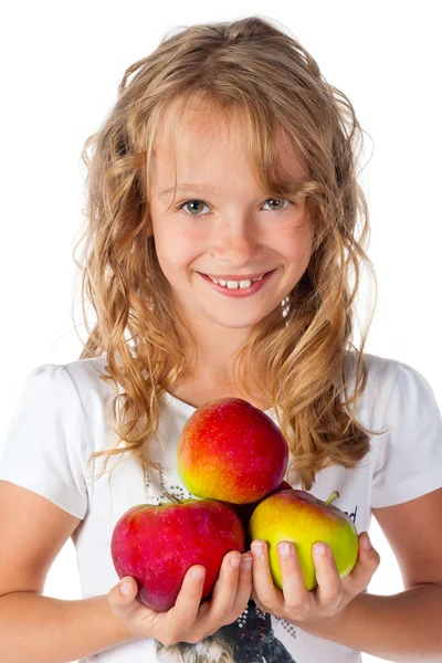 Uśmiechnięta młoda dziewczyna trzyma jabłko — Zdjęcie stockowe