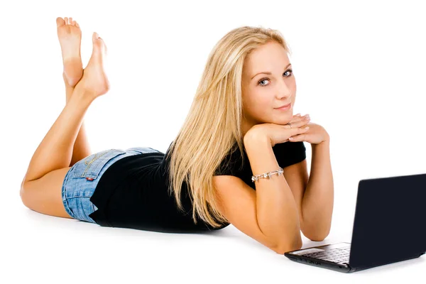 Jong sexy meisje met laptop op witte achtergrond — Stockfoto