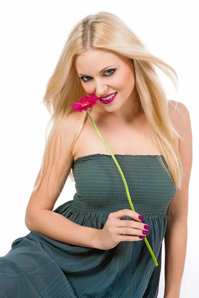 Beautiful blonde girl with flower — Stock Photo, Image