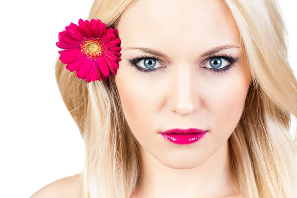 Portrait of a beautiful girl with a flower in her hair Stock Image