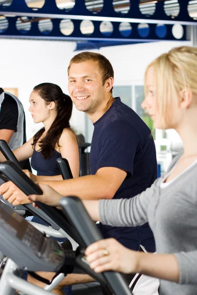 Man exercising with friends Royalty Free Stock Photos