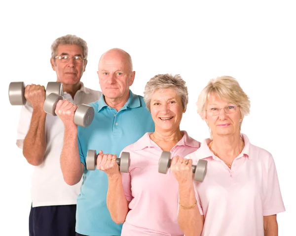 Mature older people lifting weights — Stock Photo, Image